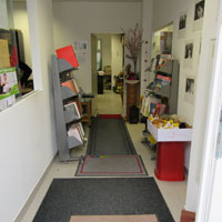Bücherecke BeLLeArTi - Eingang innen mit Bodenmatten